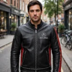 Model wearing the Acura Leather Jacket, black with red panels and silver trim racer jacket