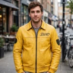 Dino Leather Jacket model view — front-facing model wearing the yellow with black sixties gt racer jacket with chest embroidery