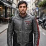Model wearing the Kia Stinger Leather Jacket, charcoal grey with red accents and black panels racer jacket