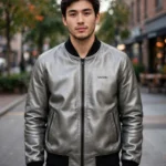 Model wearing the Lucid Leather Jacket, graphite-silver with black minimalist trim minimalist bomber jacket