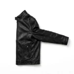 Maserati Leather Jacket side view — slim black GT racer coat with stand-up collar and quilted shoulder