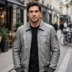 Pininfarina Leather Jacket model view — front-facing model wearing the silver grey elegance racer jacket with chest embroidery