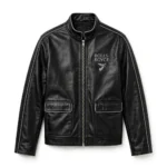 Rolls-Royce Leather Jacket front view, jet black with silver-grey trim luxury cruiser jacket, ROLLS-ROYCE wordmark with a Spirit-style flying-lady-inspired emblem motif embroidered on the left chest