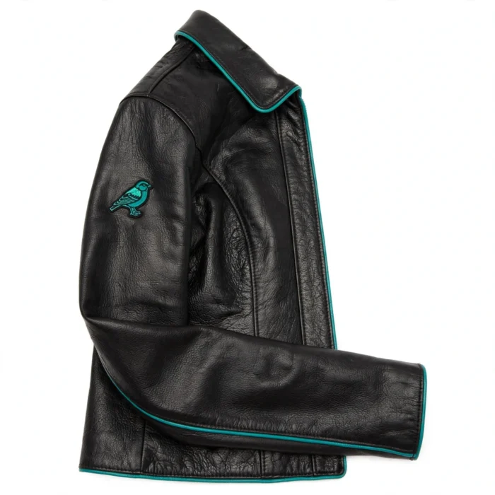 Thunderbird Leather Jacket side view, black with teal accents and bird-style chest emblem cruiser jacket
